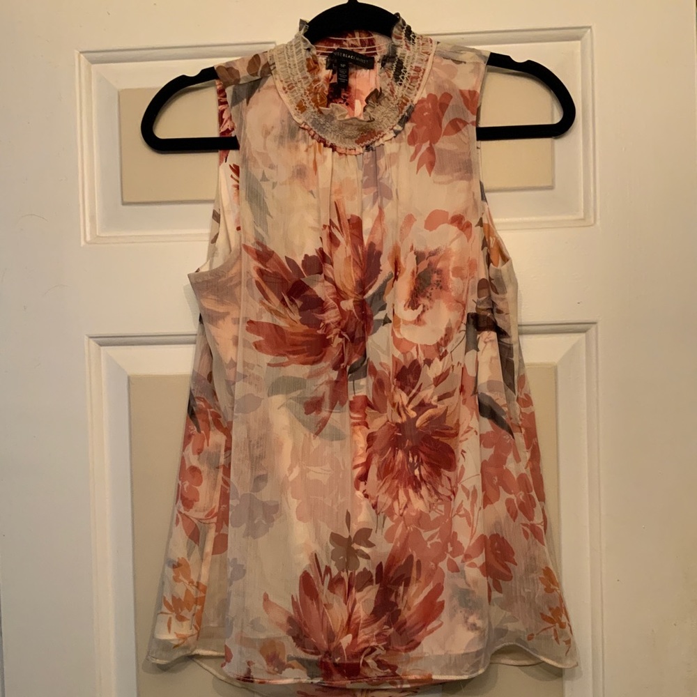 White House Black Market SP sleeveless top. Built in lining. 100% polyester.